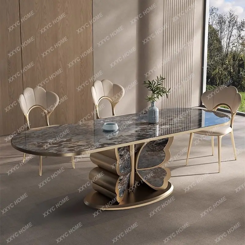 Обеденный стол из каменной плиты прямоугольной формы в стиле M Light Luxury, современный, простой, высококачественный, в стиле бабочка.
Обеденный стол из каменной плиты прямоугольной формы в стиле M Light Luxury, современный, простой, высококачественный, в стиле бабочка.