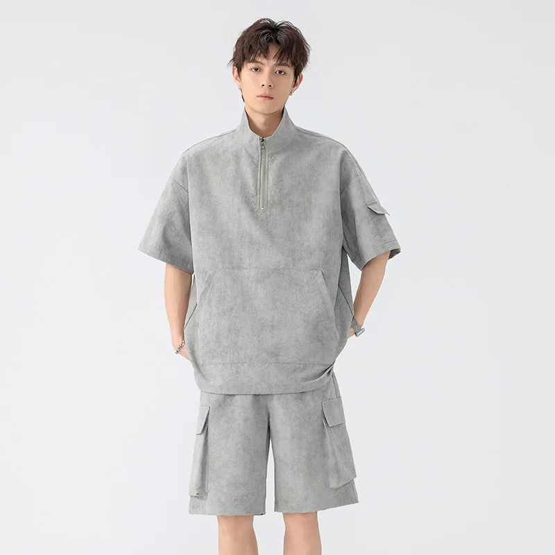 Men's Casual Tracksuit Set Half Zip Short Sleeve Top and Cargo Shorts Outfit Loose Fit Summer Streetwear Two-Piece Set
Men's Casual Tracksuit Set Half Zip Short Sleeve Top and Cargo Shorts Outfit Loose Fit Summer Streetwear Two-Piece Set