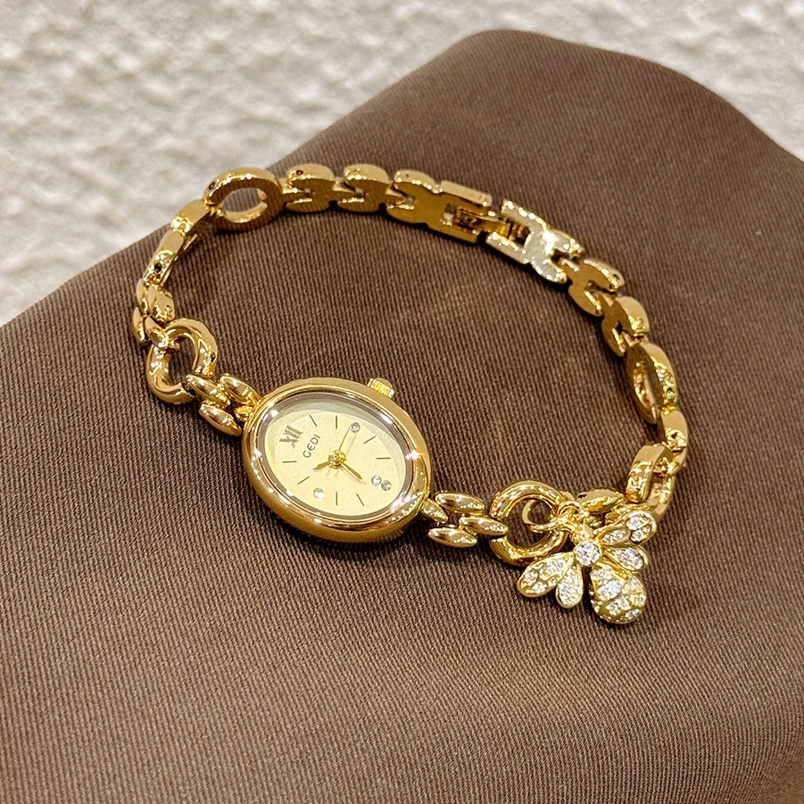 GEDI Luxury Woman Watch Gold Oval Dial Quartz Women's watch Diamond Bow Chain Bracelet Elegant Hand Clock for Women
GEDI Luxury Woman Watch Gold Oval Dial Quartz Women's watch Diamond Bow Chain Bracelet Elegant Hand Clock for Women