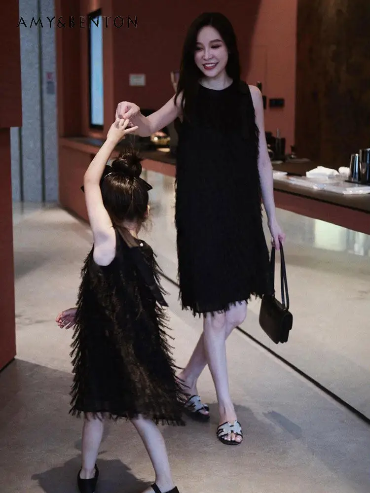 2026 Summer New High-end Luxury Family Matching Outfits Mom and Me Beach Vacation Sleeveless Tassel Princess Halter Dresses
2026 Summer New High-end Luxury Family Matching Outfits Mom and Me Beach Vacation Sleeveless Tassel Princess Halter Dresses