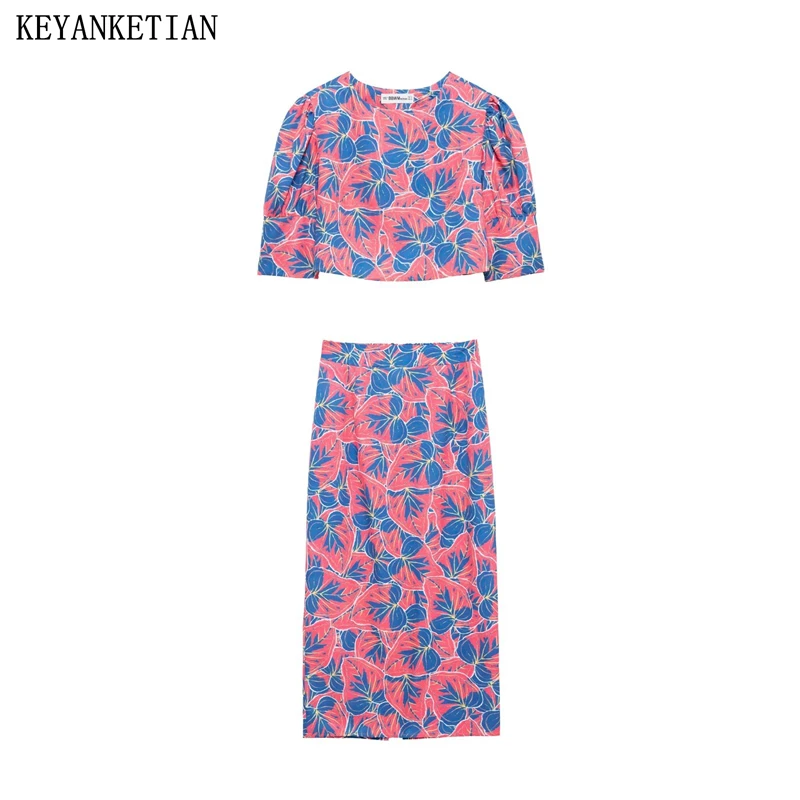 KEYANKETIAN 2025 Summer New Women's Leaves Print Puff Sleeve Crop Top Back Slit MIDI Skirt Holiday wind Slim Two Pieces Sets
KEYANKETIAN 2025 Summer New Women's Leaves Print Puff Sleeve Crop Top Back Slit MIDI Skirt Holiday wind Slim Two Pieces Sets