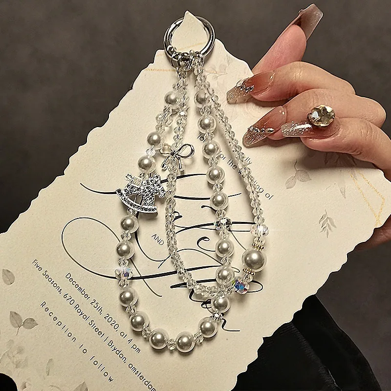 Fashionable pearl mobile phone chain luxury rhinestone Trojan mobile phone lanyard beaded double chain short anti-lost
Fashionable pearl mobile phone chain luxury rhinestone Trojan mobile phone lanyard beaded double chain short anti-lost