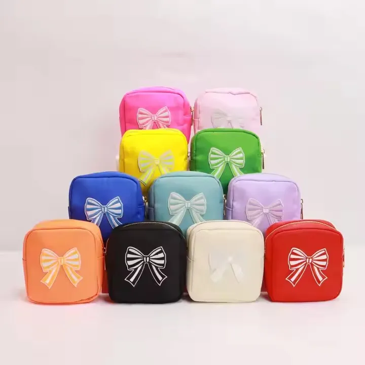 Factory Cute Bow Patched Small Waterproof Makeup Pouches Bridesmaid Christmas Gift Bags Travel Toiletry Bags Mini Nylon Pouch
Factory Cute Bow Patched Small Waterproof Makeup Pouches Bridesmaid Christmas Gift Bags Travel Toiletry Bags Mini Nylon Pouch