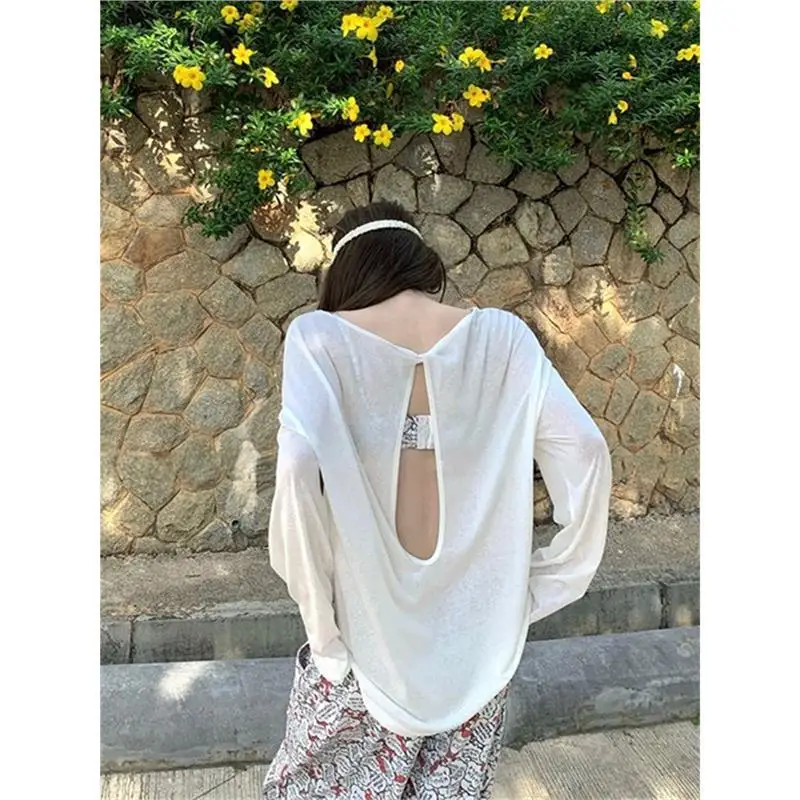2026 Summer New Women White Crew Neck Long Sleeve T Shirt Back Hollow Out Loose Thin Sun Protection Casual Daily Blouse Tops
2026 Summer New Women White Crew Neck Long Sleeve T Shirt Back Hollow Out Loose Thin Sun Protection Casual Daily Blouse Tops