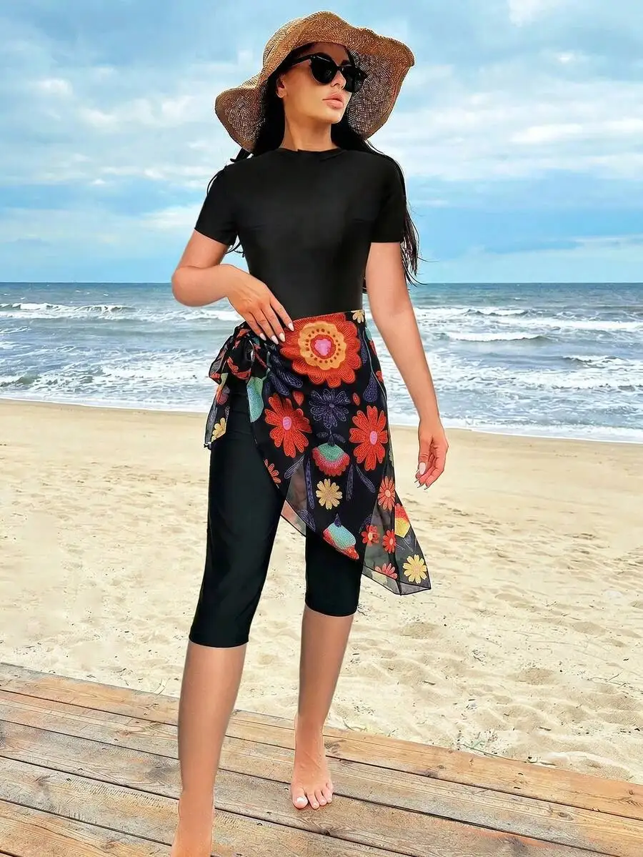 Womens Floral Print Round Neck Short Sleeve Top And Capri Shorts With Wrap Skirt
Womens Floral Print Round Neck Short Sleeve Top And Capri Shorts With Wrap Skirt