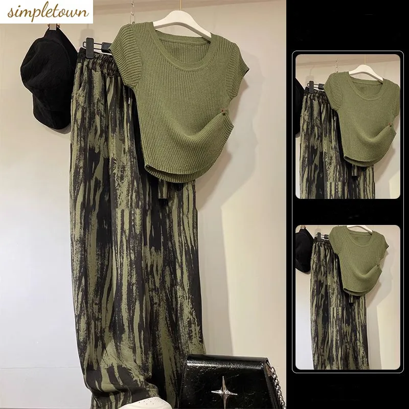 Spring and summer Korean version high-end fashionable small fragrant style top+printed wide leg pants set
Spring and summer Korean version high-end fashionable small fragrant style top+printed wide leg pants set