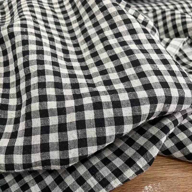 Pure linen black checkered fabric, commonly used for high-end clothing, bed sheets, duvet covers, and home DIY sewing fabrics
Pure linen black checkered fabric, commonly used for high-end clothing, bed sheets, duvet covers, and home DIY sewing fabrics