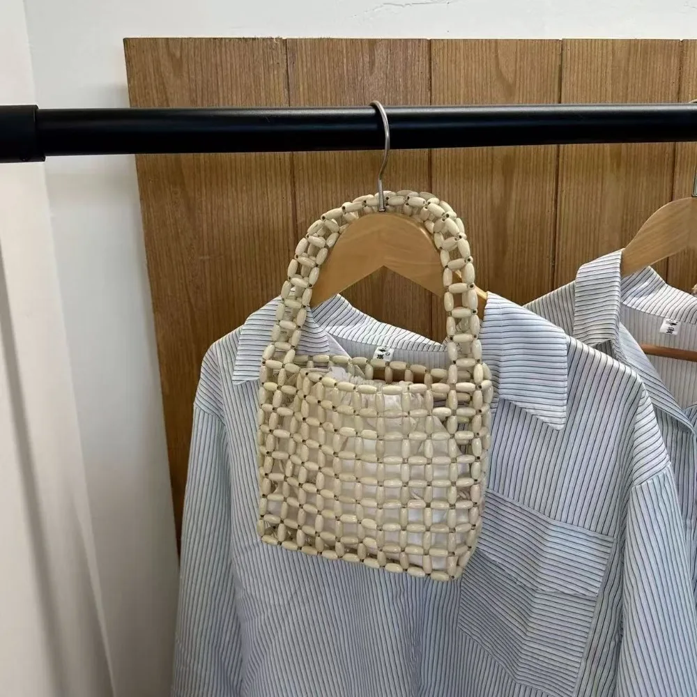 Casual Handmade Beaded Woven Bag Vintage Creative Hollow Out Bag Pure Color Chic Openwork Bag Vacation Beach
Casual Handmade Beaded Woven Bag Vintage Creative Hollow Out Bag Pure Color Chic Openwork Bag Vacation Beach