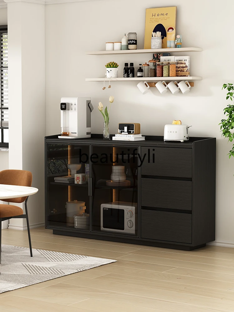 Modern simple rock slab dining side cabinet light luxury solid wood side cabinet against the wall black tea cabinet
Modern simple rock slab dining side cabinet light luxury solid wood side cabinet against the wall black tea cabinet