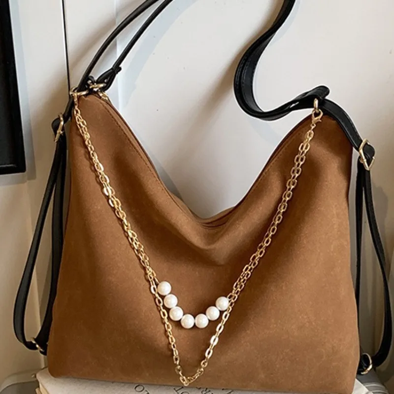 Новинка 2025 года, сумка через плечо с жемчужной цепочкой, высококачественная большая вместительная сумка, модная сумка-рюкзак для поездок на работу
Новинка 2025 года, сумка через плечо с жемчужной цепочкой, высококачественная большая вместительная сумка, модная сумка-рюкзак для поездок на работу