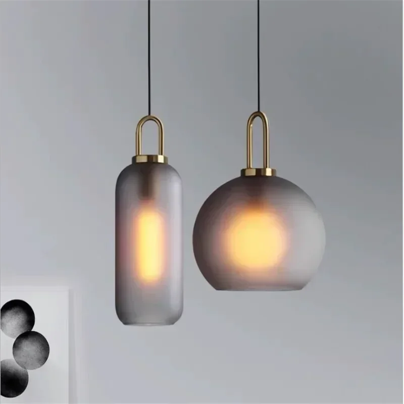 Modern creative glass ball pendant light Nordic home decoration restaurant pendant light bedroom bedside lamp lighting fixture
Modern creative glass ball pendant light Nordic home decoration restaurant pendant light bedroom bedside lamp lighting fixture
