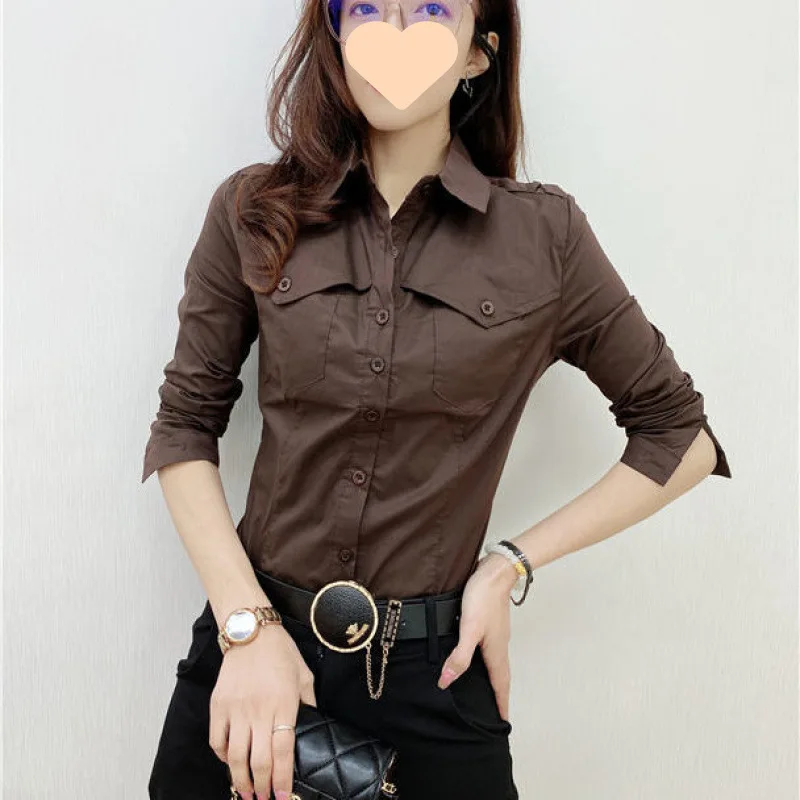 Весенняя рубашка с лацканами для женщин, офисные женские блузки с карманами, однотонная тонкая профессиональная рубашка с длинными рукавами
Весенняя рубашка с лацканами для женщин, офисные женские блузки с карманами, однотонная тонкая профессиональная рубашка с длинными рукавами
