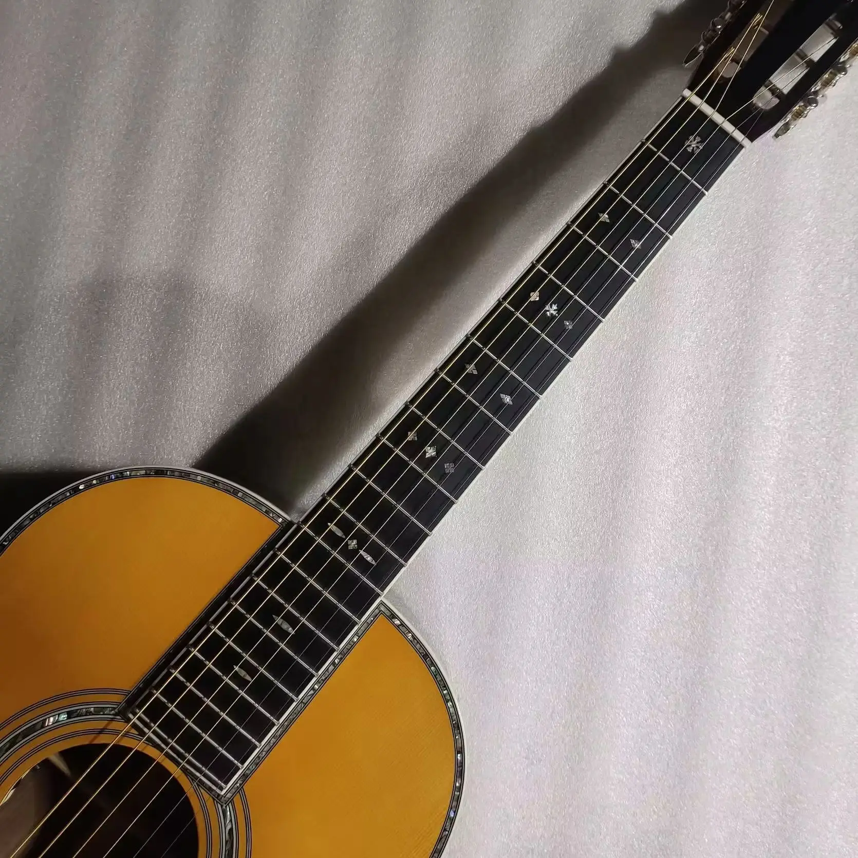 an OOO 12 fret wide neck professional acoustic electric guitar ,633 scale length guitar OOO42
an OOO 12 fret wide neck professional acoustic electric guitar ,633 scale length guitar OOO42