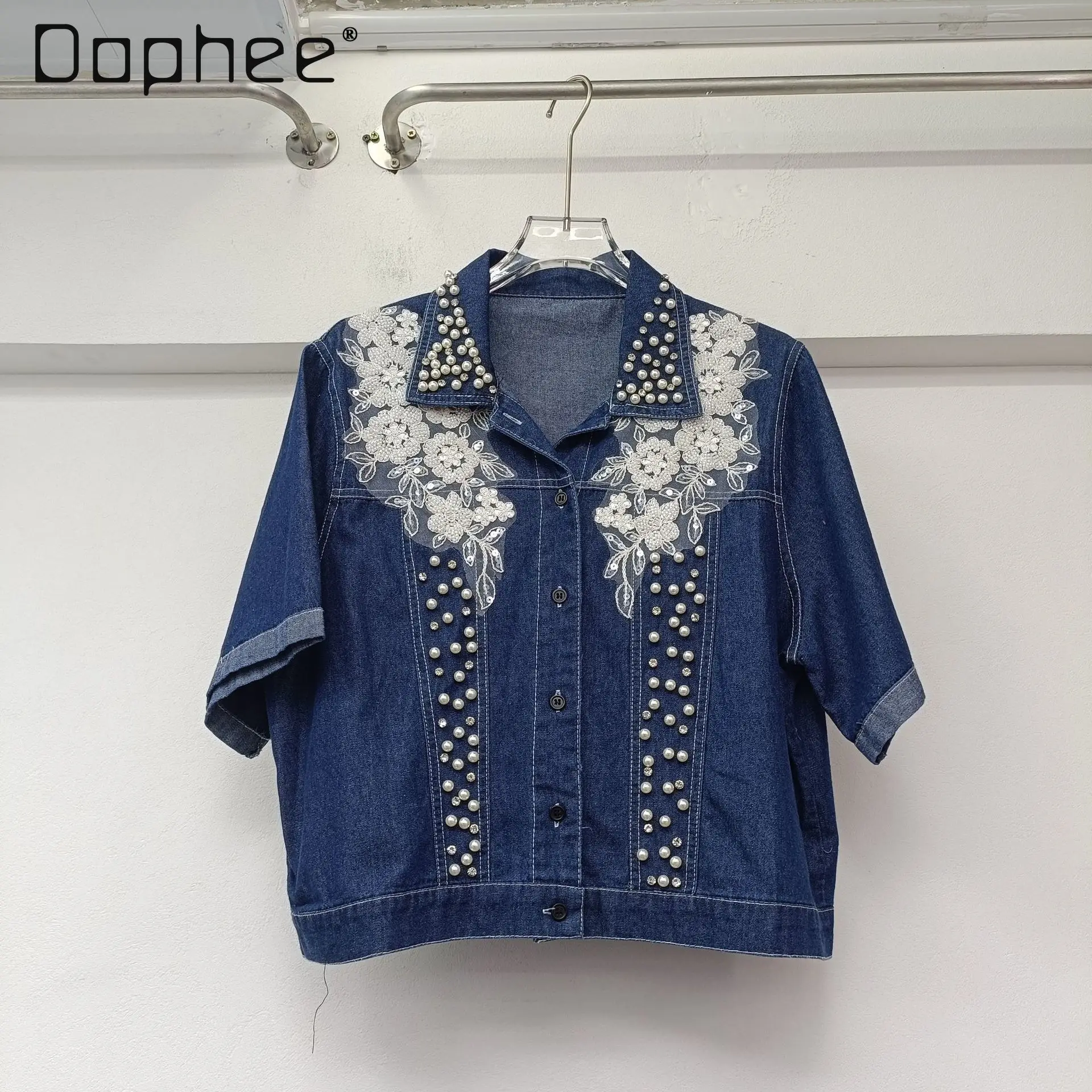 Commuter Style Casual Denim Suit Heavy Industry Beaded Denim Top + High Waist Versatile Umbrella Skirt High Sense Two-piece Set
Commuter Style Casual Denim Suit Heavy Industry Beaded Denim Top + High Waist Versatile Umbrella Skirt High Sense Two-piece Set