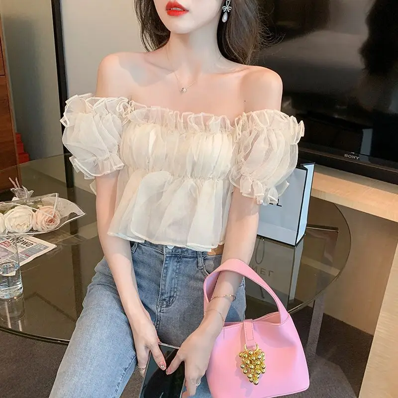 Женская рубашка свободного кроя с короткими рукавами-фонариками и воротником-шалькой во французском стиле, элегантный топ для весны и лета, визуально стройнящий фигуру
Женская рубашка свободного кроя с короткими рукавами-фонариками и воротником-шалькой во французском стиле, элегантный топ для весны и лета, визуально стройнящий фигуру