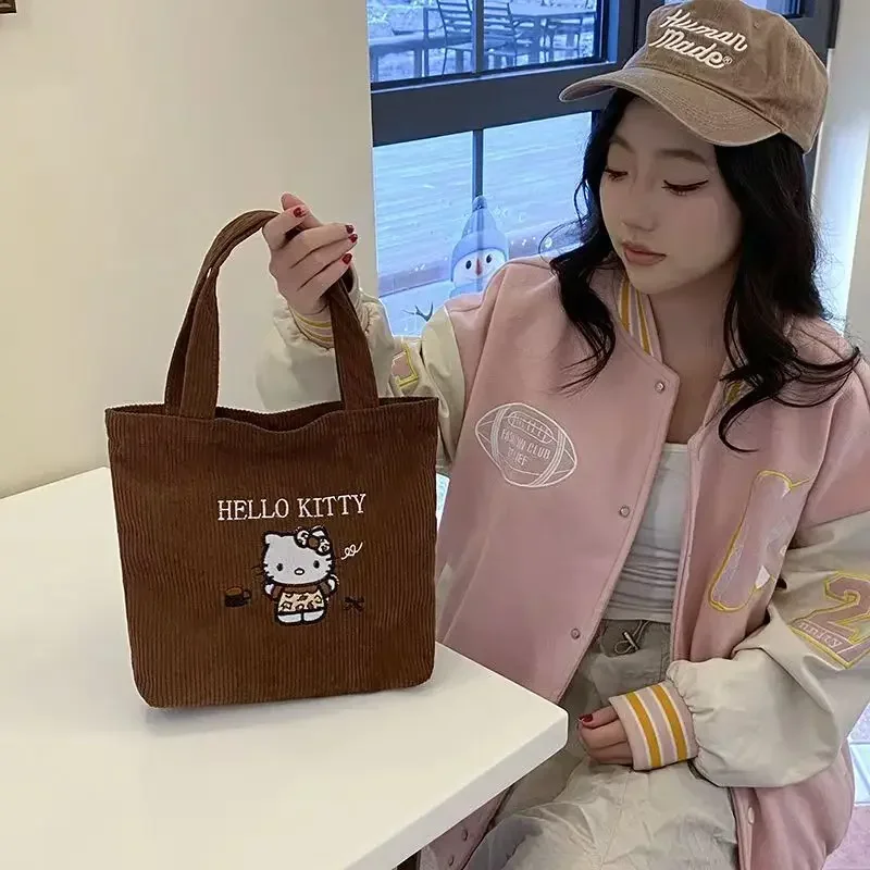 New Hello Kitty Corduroy Cartoon Cute Embroidery Large Capacity Handbag Kawaii Sanrio Series Japanese Small Bag Student Bag Gift
New Hello Kitty Corduroy Cartoon Cute Embroidery Large Capacity Handbag Kawaii Sanrio Series Japanese Small Bag Student Bag Gift