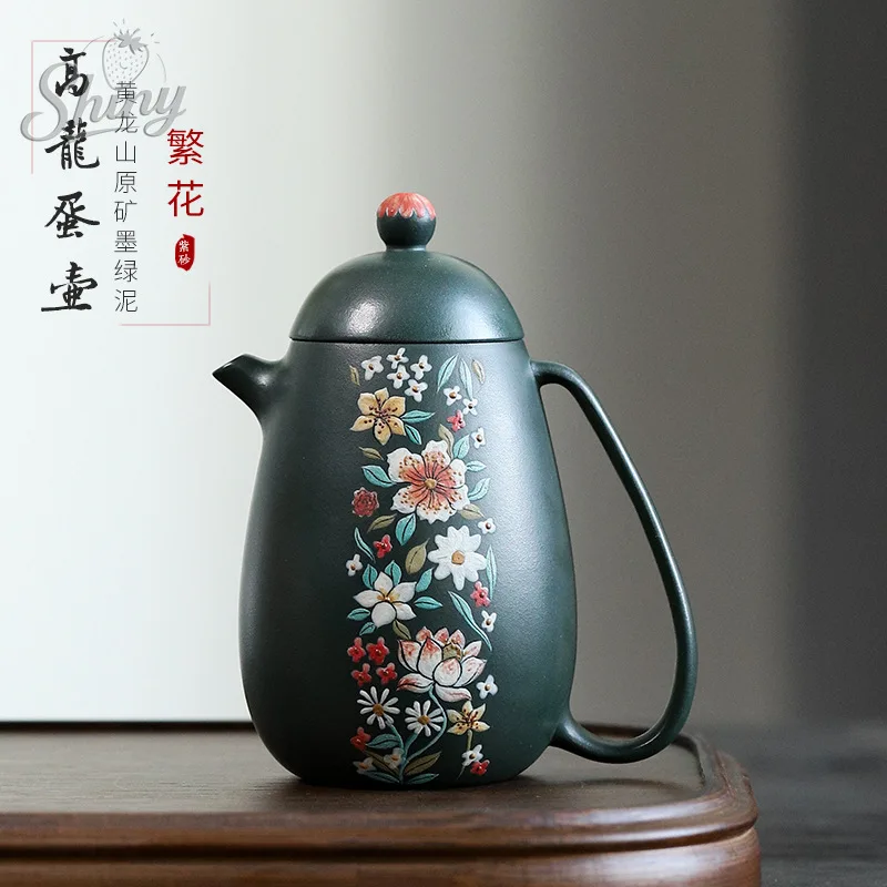 Original Mine Dark Green Clay Purple Sand Pot Hand-painted Flowers High Dragon Egg Teapot Home Kung Fu Tea Set
Original Mine Dark Green Clay Purple Sand Pot Hand-painted Flowers High Dragon Egg Teapot Home Kung Fu Tea Set