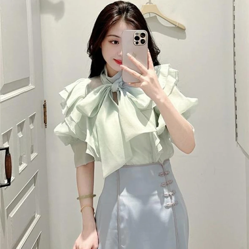 Новая весенне-летняя однотонная шифоновая блузка с воротником-стойкой, бантом и коротким рукавом, стандартной длины, для повседневной носки
Новая весенне-летняя однотонная шифоновая блузка с воротником-стойкой, бантом и коротким рукавом, стандартной длины, для повседневной носки