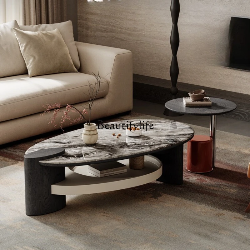 Italian minimalist microcrystalline stone special-shaped coffee table, high-end high-low combination coffee table
Italian minimalist microcrystalline stone special-shaped coffee table, high-end high-low combination coffee table
