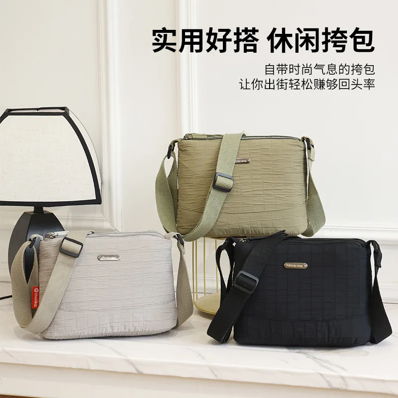 Large capacity ladies casual light travel nylon pleated wear-resistant shoulder crossbody bag
Large capacity ladies casual light travel nylon pleated wear-resistant shoulder crossbody bag