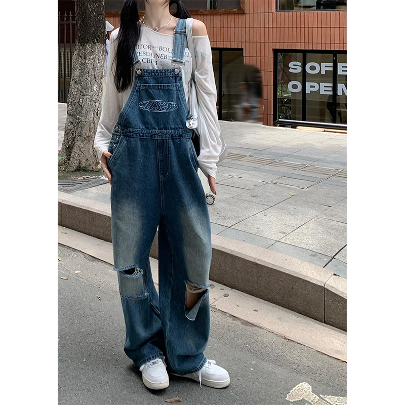 Streetwear Hole Jumpsuit Women Print Denim Overalls Vintage Wide Leg Jeans Korean Baggy Suspend Pants High Waist Casual Trousers
Streetwear Hole Jumpsuit Women Print Denim Overalls Vintage Wide Leg Jeans Korean Baggy Suspend Pants High Waist Casual Trousers