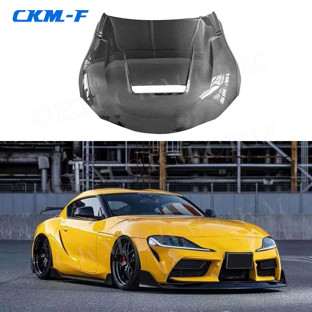 Передний бампер из углеродного волокна, капот двигателя, вентиляционные отверстия, автостайлинг для Toyota Supra A Style 2019 2020
Передний бампер из углеродного волокна, капот двигателя, вентиляционные отверстия, автостайлинг для Toyota Supra A Style 2019 2020