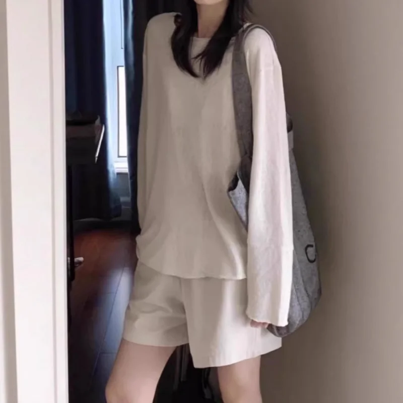 Korean-style white round-neck silk knitted long-sleeve shirttWomen's summer thin loose-fitting conditioni
Korean-style white round-neck silk knitted long-sleeve shirttWomen's summer thin loose-fitting conditioni