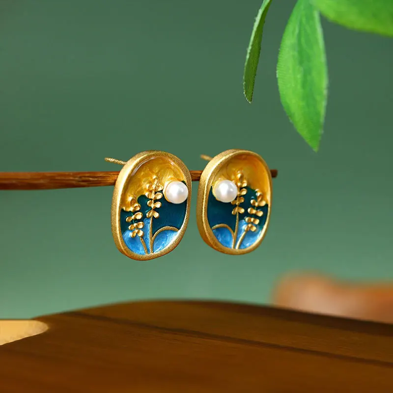 New Chinese style retro color creative oil painting, wheat ears dripping oil, pearls, Chinese style lotus leaf earrings, female
New Chinese style retro color creative oil painting, wheat ears dripping oil, pearls, Chinese style lotus leaf earrings, female