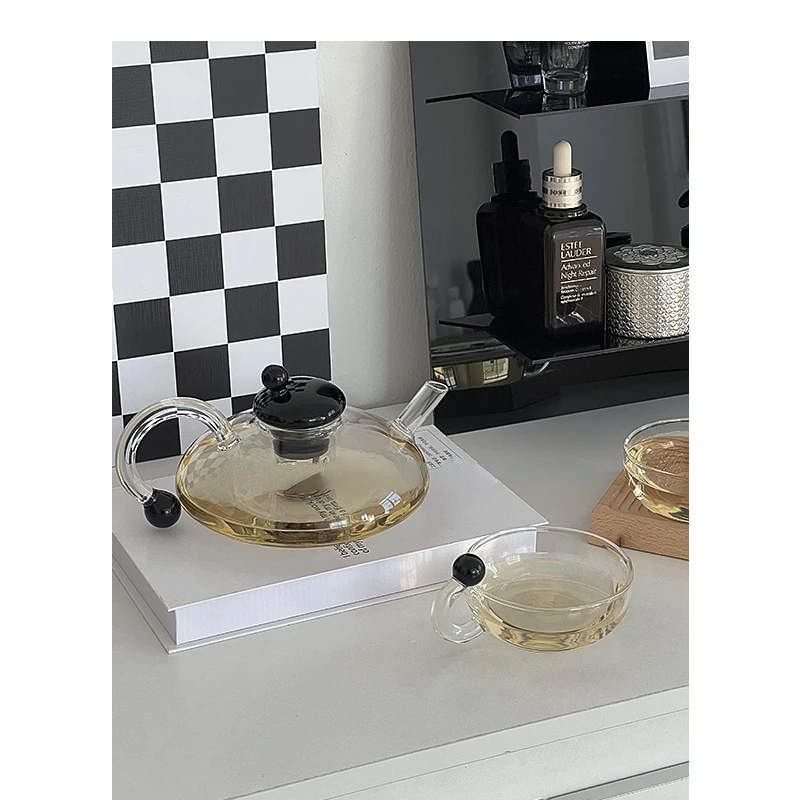 Glass Teacup Teapot Set Transparent Flower Tea Filter Pot Round Coffee Pot Lovely Glass Decoration Cup Afternoon Tea
Glass Teacup Teapot Set Transparent Flower Tea Filter Pot Round Coffee Pot Lovely Glass Decoration Cup Afternoon Tea