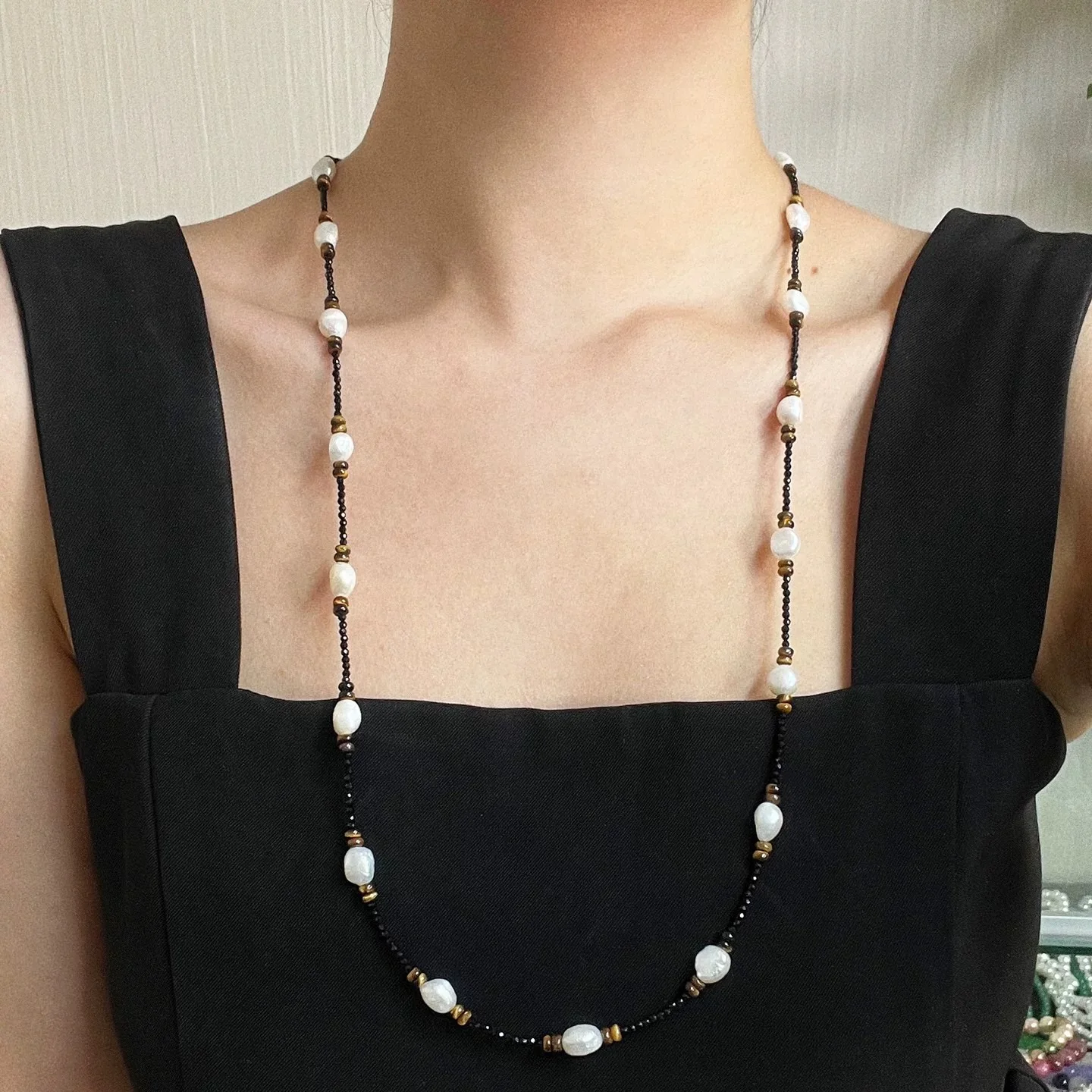 Black Spinel Crystal With Natural freshwaer Pearl and tiger eye stone Sweater Necklace
Black Spinel Crystal With Natural freshwaer Pearl and tiger eye stone Sweater Necklace