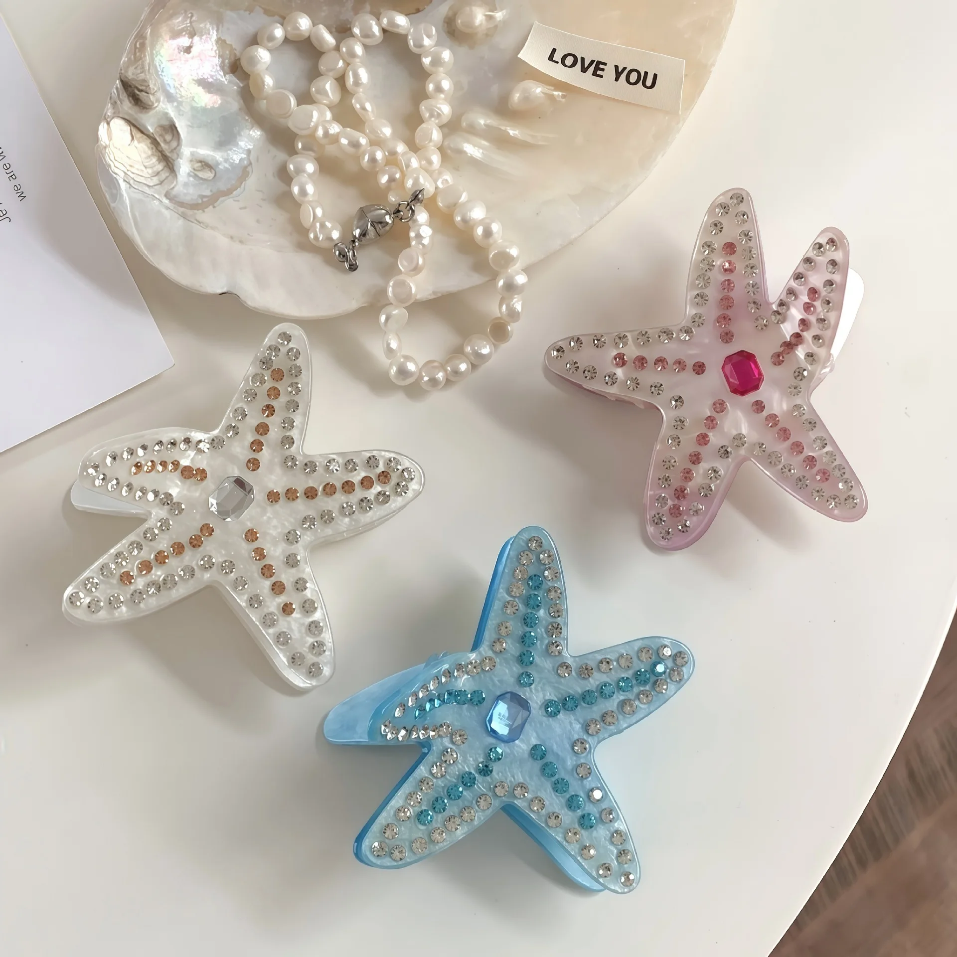1pc exquisite starfish acetate grab clip, diamond-studded blue and pink premium hairpin, shark clip on the back of head
1pc exquisite starfish acetate grab clip, diamond-studded blue and pink premium hairpin, shark clip on the back of head