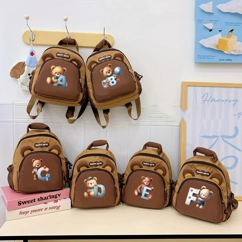 Cute back-to-school cartoon children's backpack, featuring A-Z bear letter patterns and made of lightweight nylon material.
Cute back-to-school cartoon children's backpack, featuring A-Z bear letter patterns and made of lightweight nylon material.