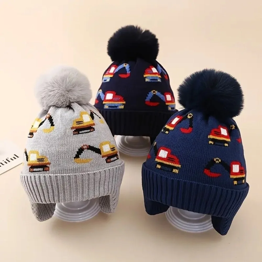 Fashion Warm Fleece Lining Kids Winter Hat Adjustable Ear Protection Ear Flaps Hat Excavator Print Knitted Beanie Winter
Fashion Warm Fleece Lining Kids Winter Hat Adjustable Ear Protection Ear Flaps Hat Excavator Print Knitted Beanie Winter