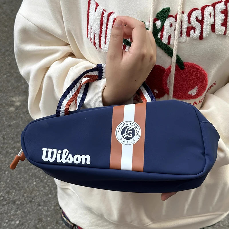 Небольшая Ручная сумка Wilson из искусственной кожи, туристические аксессуары для тенниса, миниатюрная дорожная сумка Roland Garros, Спортивная ракетка
Небольшая Ручная сумка Wilson из искусственной кожи, туристические аксессуары для тенниса, миниатюрная дорожная сумка Roland Garros, Спортивная ракетка
