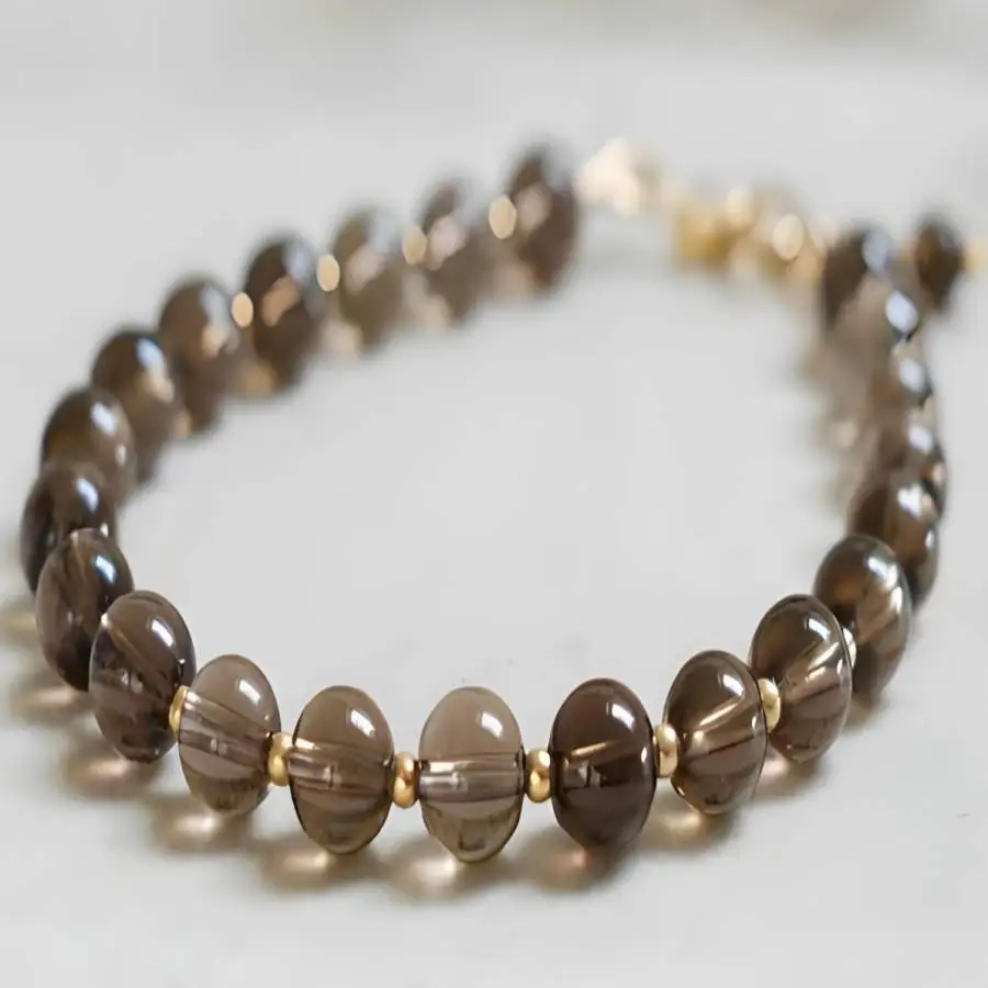Natural Smoky Quartz Beaded Bracelet with Gold Spacers & Gold Clasp Healing Crystal Jewelry for Men Women
Natural Smoky Quartz Beaded Bracelet with Gold Spacers & Gold Clasp Healing Crystal Jewelry for Men Women