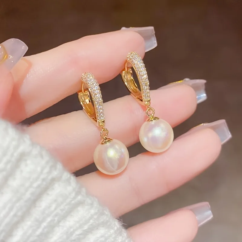 A Pair of Micro-pave Fashion Heart-shaped Earrings with Imitation
A Pair of Micro-pave Fashion Heart-shaped Earrings with Imitation