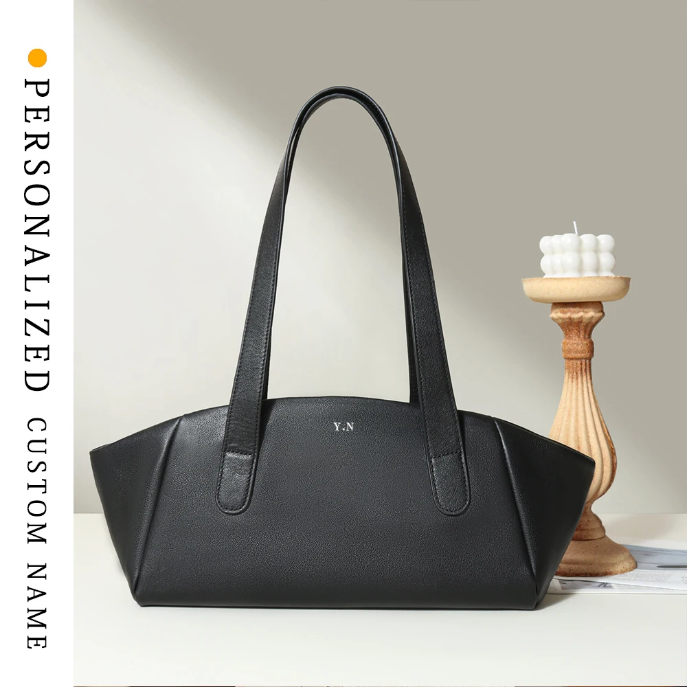 First layer cowhide tote bag for women 2025 new fashion simple niche wing bag large capacity commuting handbag women's bag
First layer cowhide tote bag for women 2025 new fashion simple niche wing bag large capacity commuting handbag women's bag