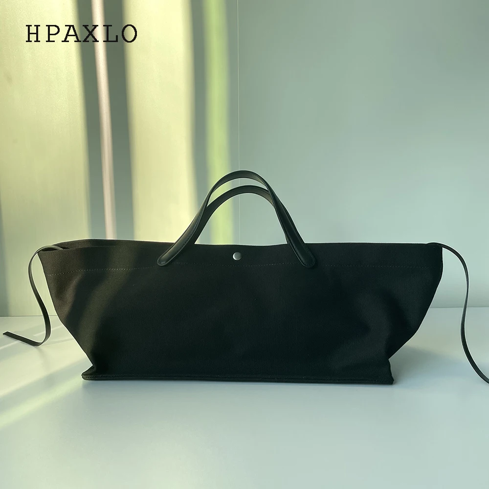 Canvas splicing head layer cowhide tote bag new niche design large capacity minimalist style casual fashionable ladies handbag
Canvas splicing head layer cowhide tote bag new niche design large capacity minimalist style casual fashionable ladies handbag