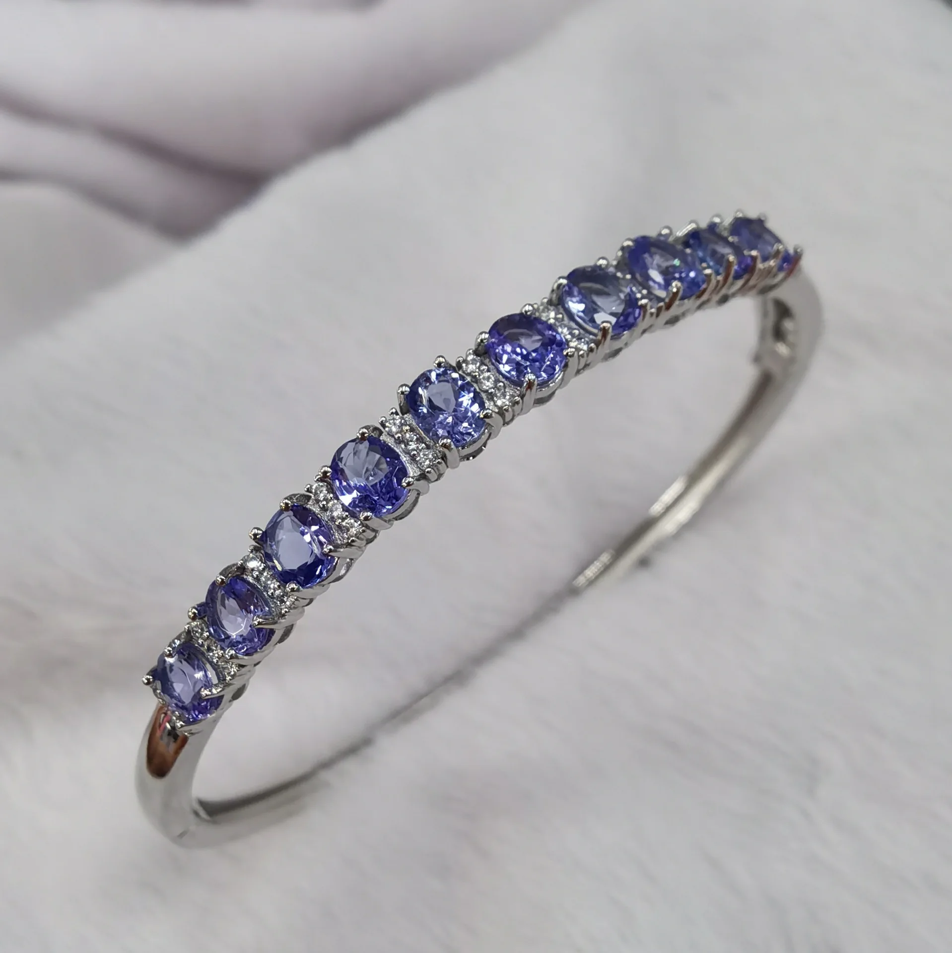 Natural Tanzanite Bangle with Accent Stones, S925 Silver White Gold Plated Delicate Jewelry
Natural Tanzanite Bangle with Accent Stones, S925 Silver White Gold Plated Delicate Jewelry