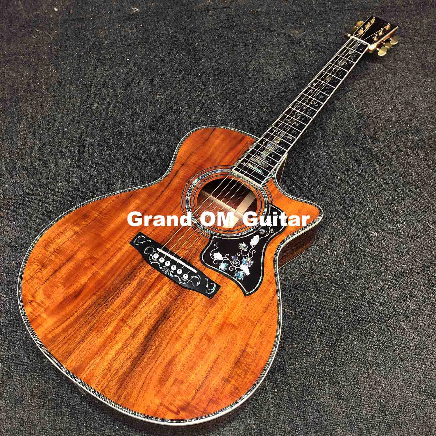 custom cutaway solid koa back side acoustic guitar
custom cutaway solid koa back side acoustic guitar
