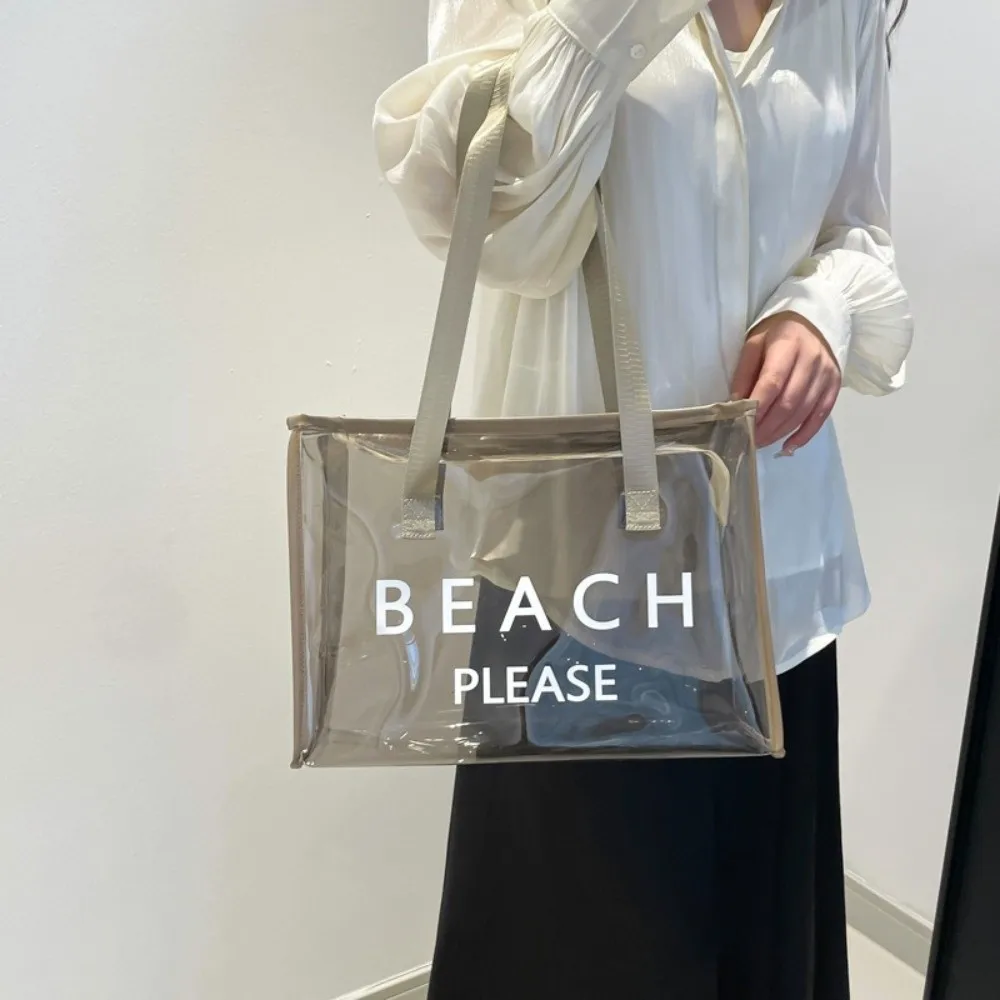Portable PVC Transparent Tote Bag Zipper Reusable Jelly Handbag Cosmetic Bag Storage Bag Letter Shoulder Bag Fitness
Portable PVC Transparent Tote Bag Zipper Reusable Jelly Handbag Cosmetic Bag Storage Bag Letter Shoulder Bag Fitness