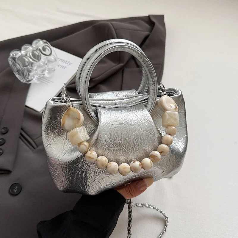 Silver Handbag Women 2025 Fashion Round Handle Tote Vintage Beading Chain Clutch Bag Solid Pu Leather Crossbody Shoulder Bags
Silver Handbag Women 2025 Fashion Round Handle Tote Vintage Beading Chain Clutch Bag Solid Pu Leather Crossbody Shoulder Bags