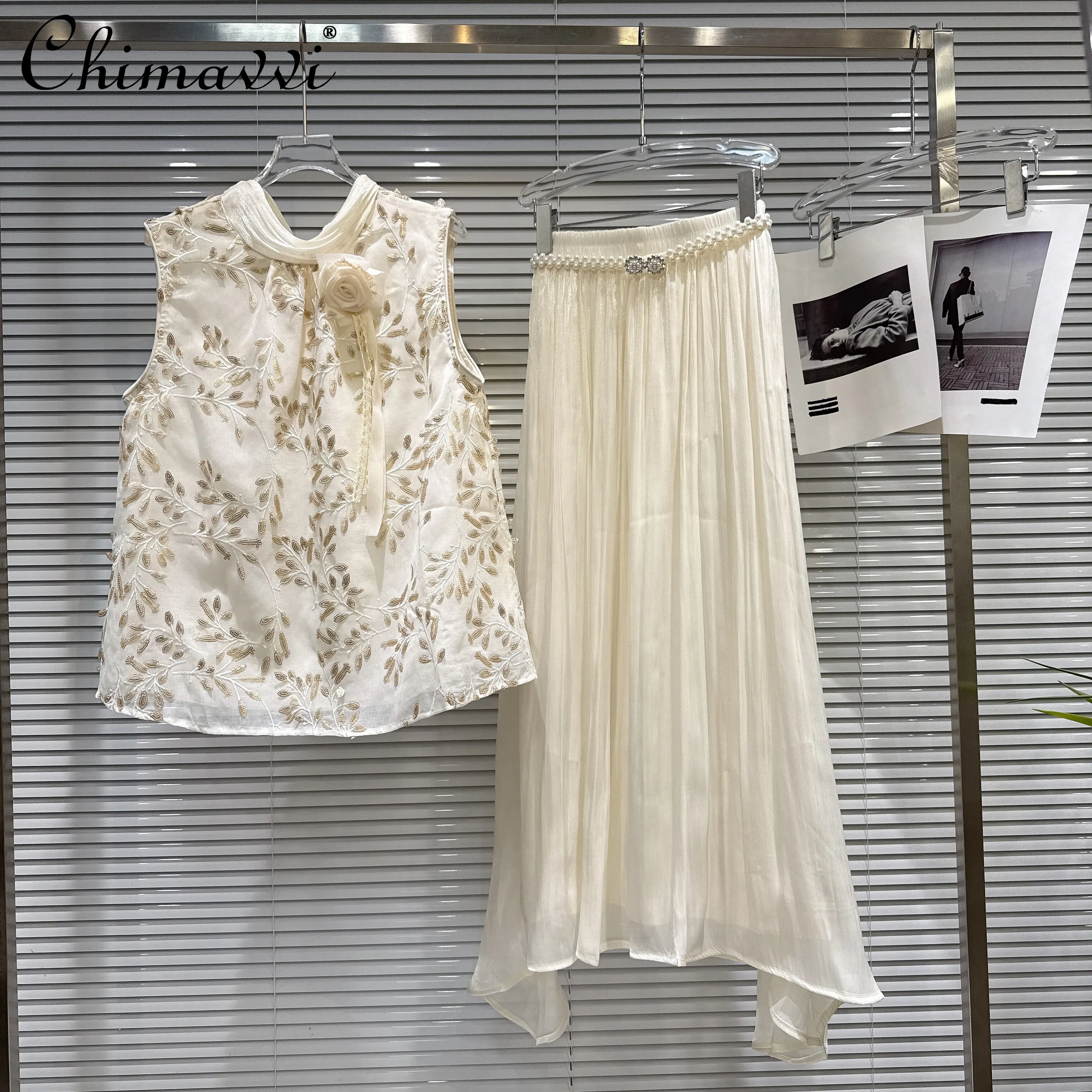 2026 Summer French Elegant Leaf Sequins Embroidered Sleeveless Shirt Top High Waist Chiffon Long Skirt Two-piece Sets for Women
2026 Summer French Elegant Leaf Sequins Embroidered Sleeveless Shirt Top High Waist Chiffon Long Skirt Two-piece Sets for Women