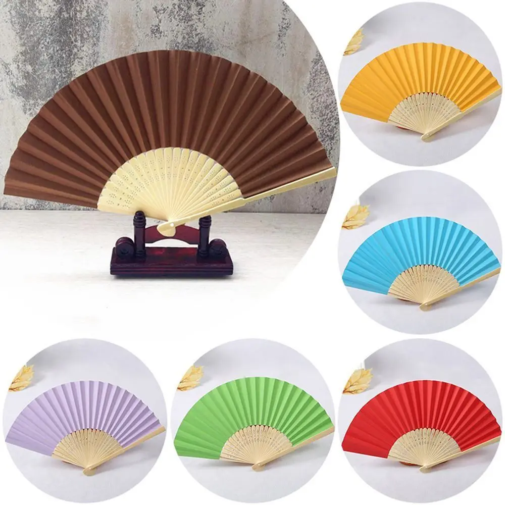 Portable DecorationTool Gifts Solid Color Chinese Style Folding Party Folding Paper Fan Photo Prop Tool Dance Fan Hand Held Fan
Portable DecorationTool Gifts Solid Color Chinese Style Folding Party Folding Paper Fan Photo Prop Tool Dance Fan Hand Held Fan