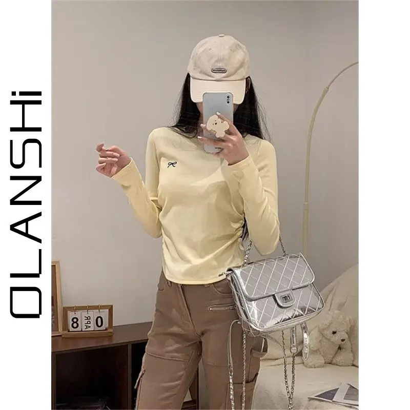 Sweet and Spicy Wind Slim Spice Long Sleeve T-shirt Women's New Autumn Bow Embroidery Round Neck Shoulder Cotton Base Shirt Top
Sweet and Spicy Wind Slim Spice Long Sleeve T-shirt Women's New Autumn Bow Embroidery Round Neck Shoulder Cotton Base Shirt Top