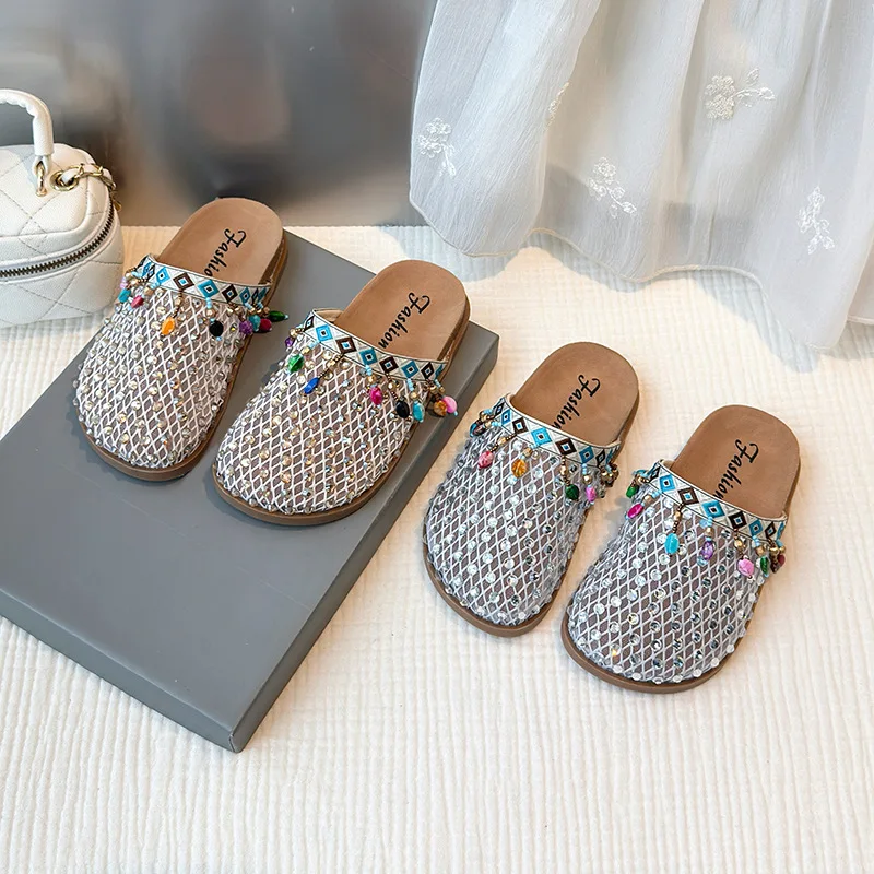 Zapatos/тапочки для девочек, новые летние тапочки в этническом стиле с бриллиантами и кисточками для рыбалки, удобная детская пляжная обувь на толстой подошве
Zapatos/тапочки для девочек, новые летние тапочки в этническом стиле с бриллиантами и кисточками для рыбалки, удобная детская пляжная обувь на толстой подошве