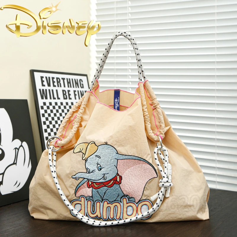 Disney Dumbo новая женская сумка нейлоновая вышитая мультяшная роскошная женская сумка на плечо большая вместительная повседневная женская сумка для хранения
Disney Dumbo новая женская сумка нейлоновая вышитая мультяшная роскошная женская сумка на плечо большая вместительная повседневная женская сумка для хранения