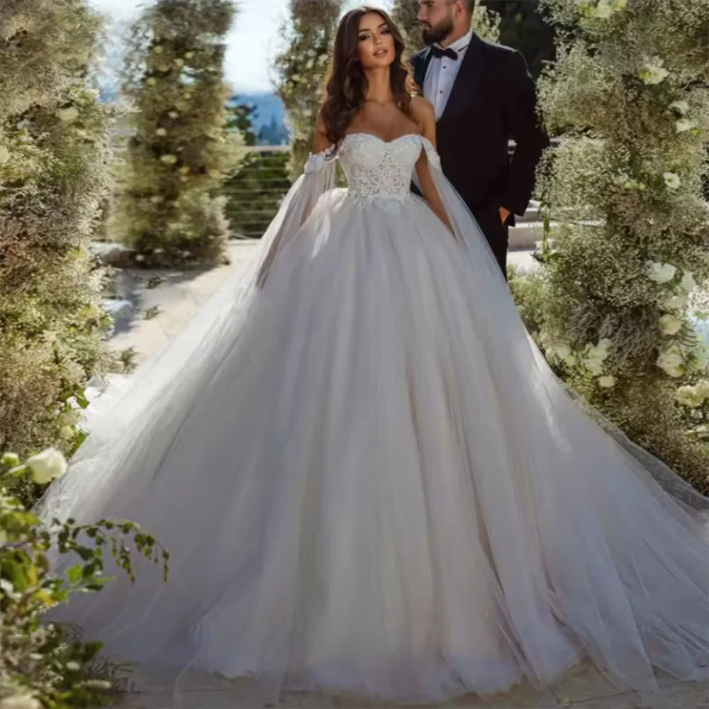 ZJ9386 Romantic Off The Shoulder Ball Gown Wedding Dress 2025 Luxury Beading Appliques Princess Bridal Gown
ZJ9386 Romantic Off The Shoulder Ball Gown Wedding Dress 2025 Luxury Beading Appliques Princess Bridal Gown