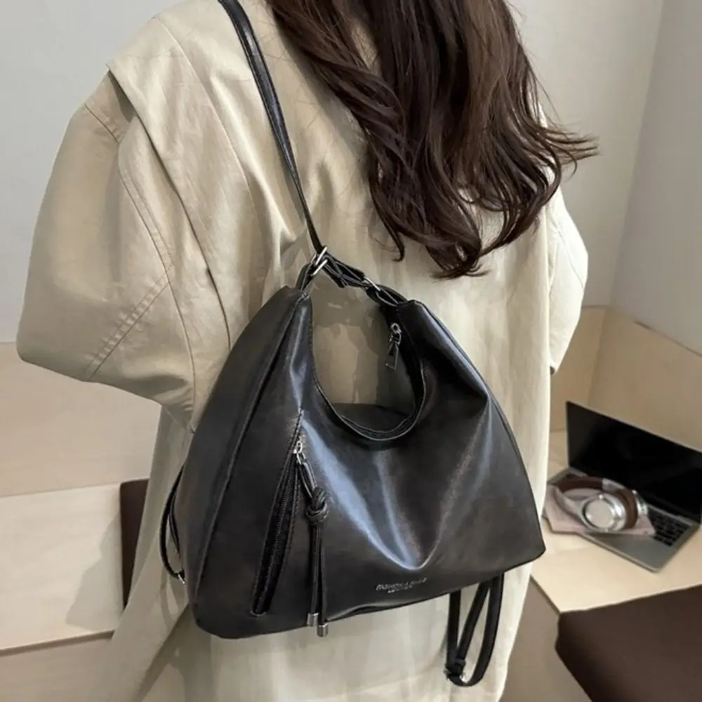 Multifuctional Oil Wax Leather Shoulder Bag Large Capacity Zipper Closure Crossbody Bag Adjustable Strap Solid Color Handbag
Multifuctional Oil Wax Leather Shoulder Bag Large Capacity Zipper Closure Crossbody Bag Adjustable Strap Solid Color Handbag