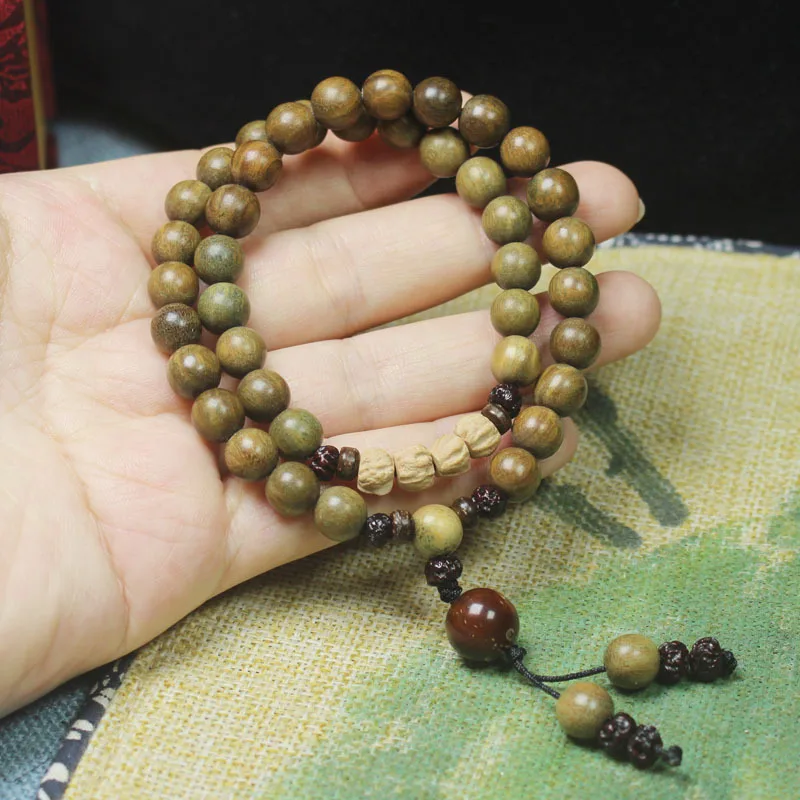 Green Sandalwood 8mm Bead Bracelet with Fresh Fragrance Forest Style Beaded Bracelet for Men and Women Gifts
Green Sandalwood 8mm Bead Bracelet with Fresh Fragrance Forest Style Beaded Bracelet for Men and Women Gifts